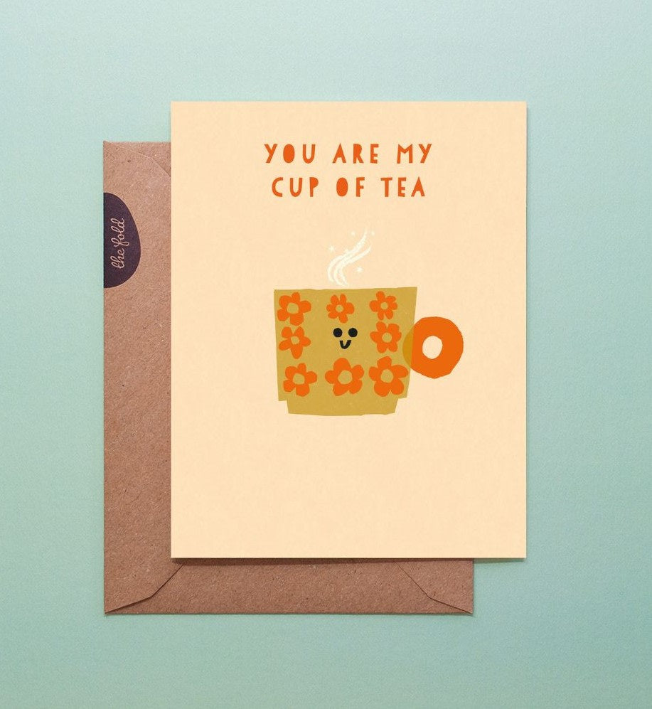 Greeting card with a cup of tea illustration and 'You are my cup of tea' text on a light blue background.