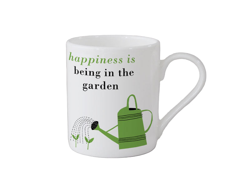 White mug with green watering can and text 'happiness is being in the garden' on a gray background