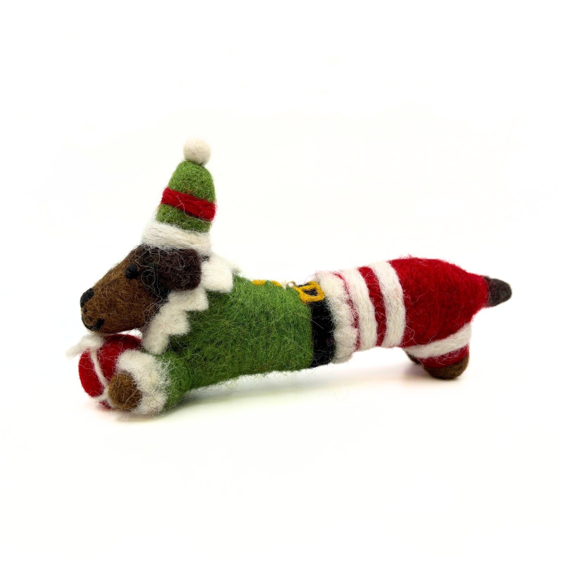 Felted Christmas-themed dog toy with a green body, red and white striped legs, and a Santa hat on a white background.