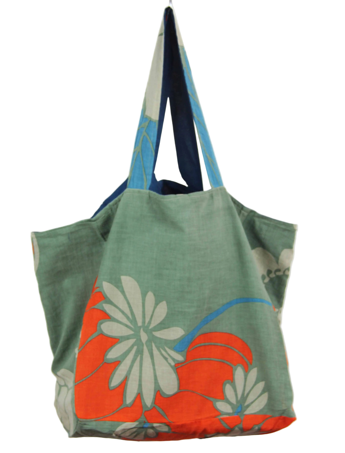 Green tote bag with floral design on a white background