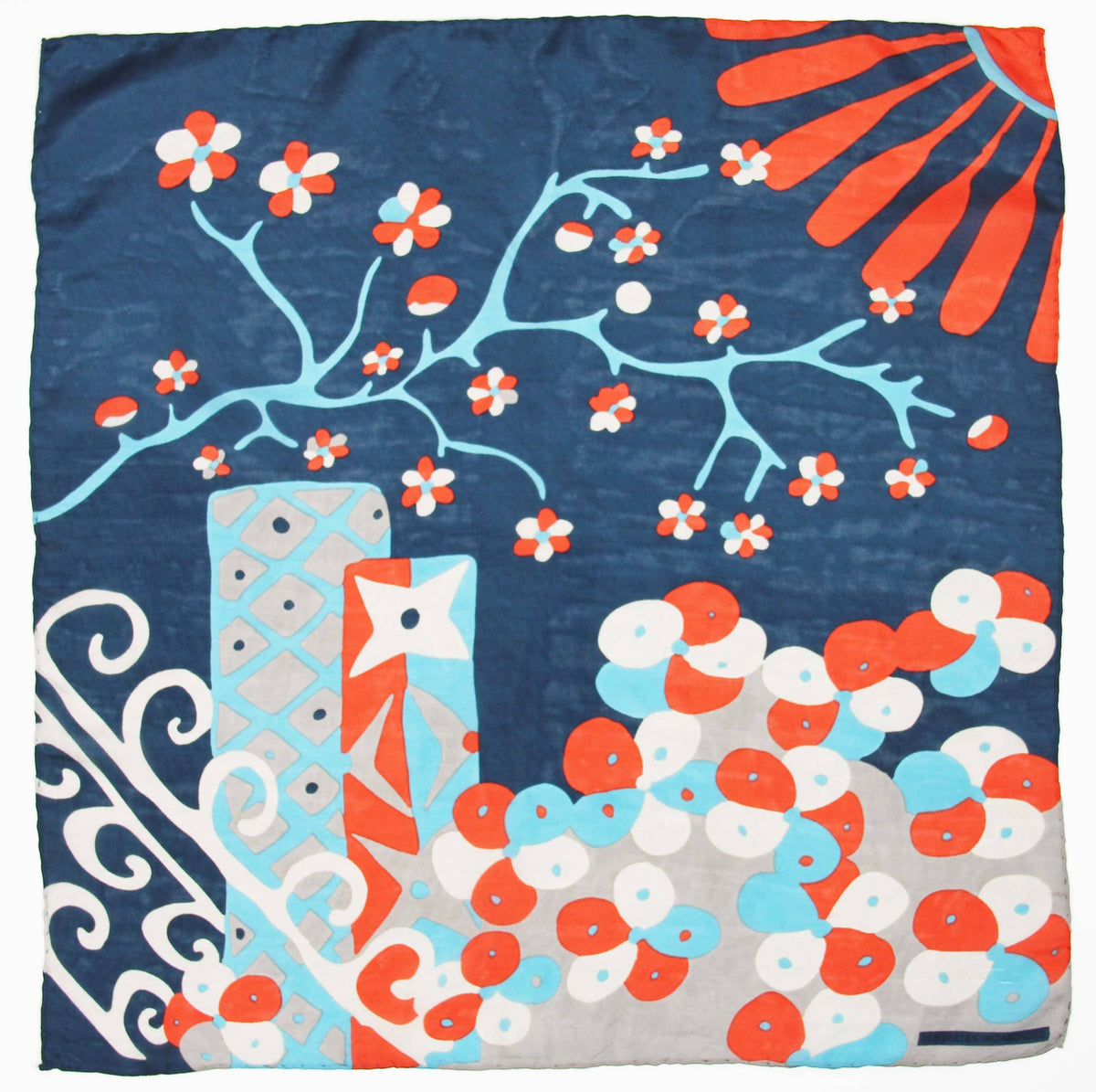 Colorful patterned fabric with floral and abstract designs on a blue background