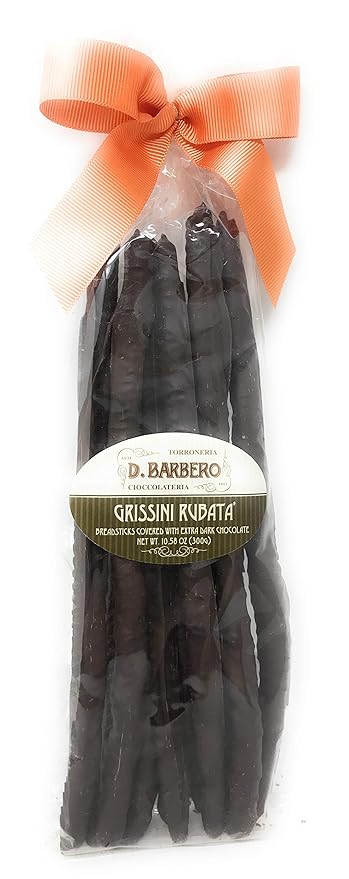 Packaged chocolate with an orange bow on a white background