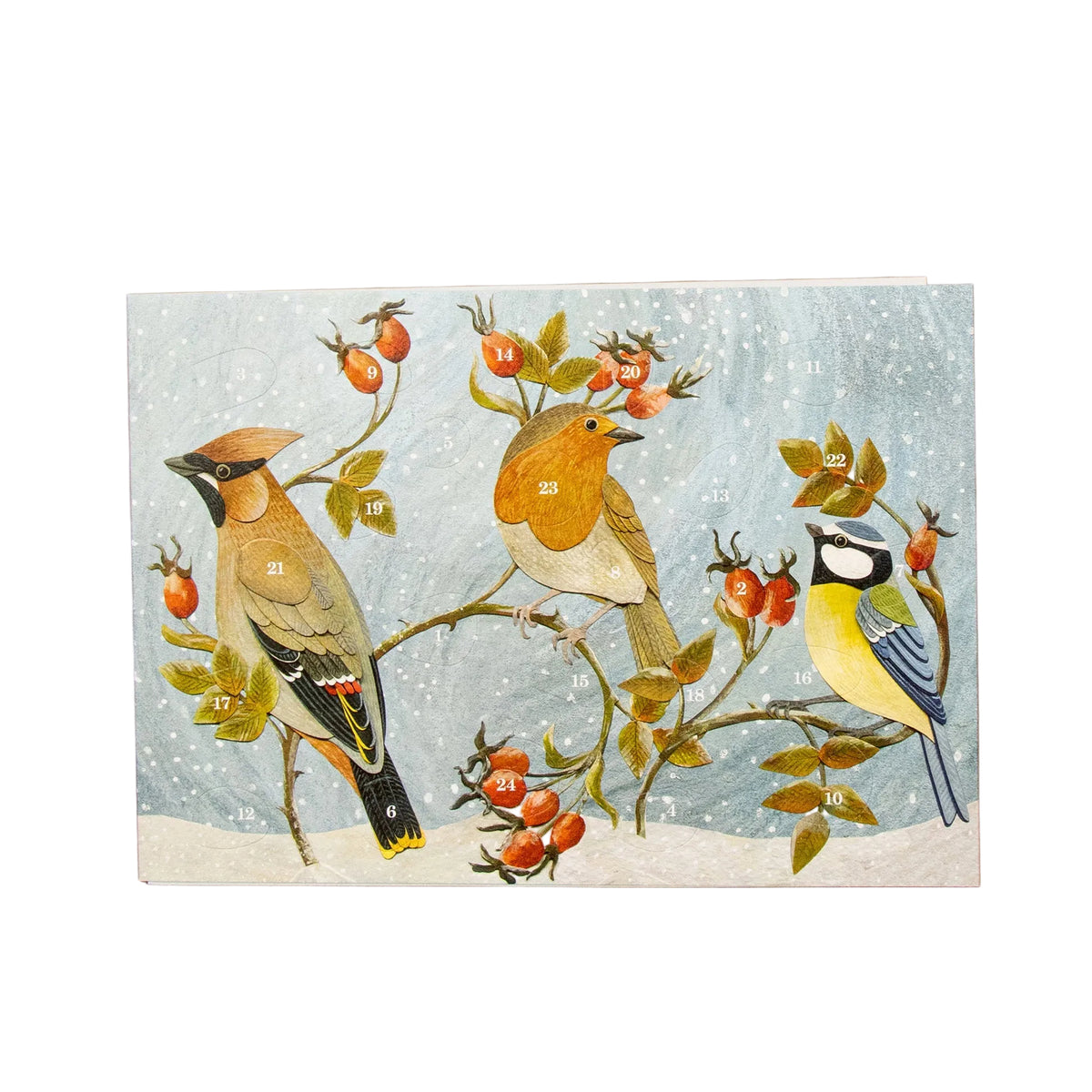 A square greeting card featuring a winter bird illustration with three birds perched on branches with red berries, set against a snowy blue-gray background and displayed on a wooden surface.