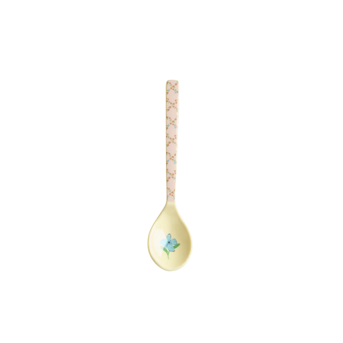 Decorative spoon with a floral design on a white background