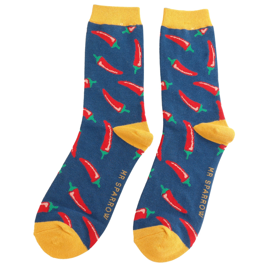Blue socks with red chili pepper pattern and yellow accents on a white background