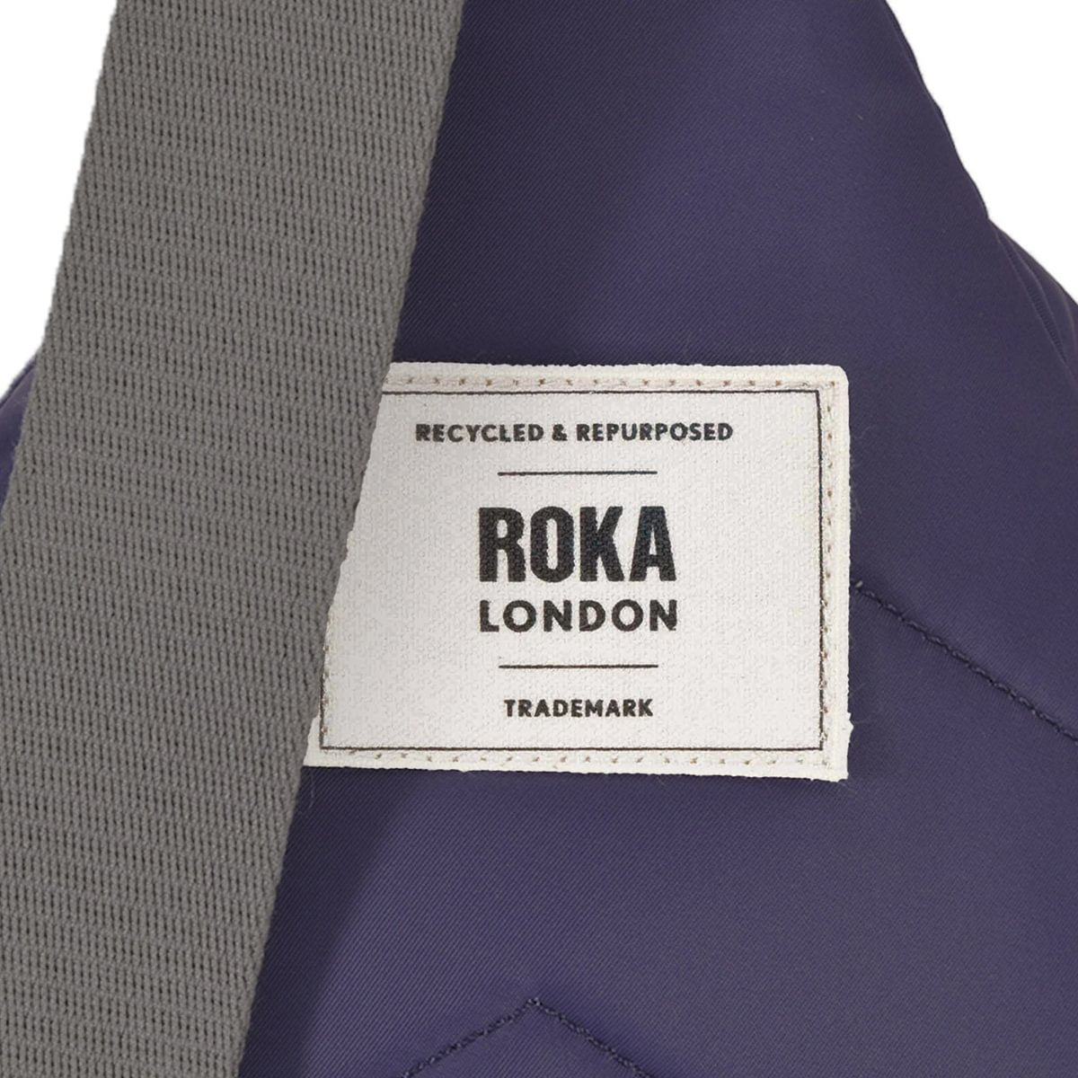 Roka London label on a product with recycled and repurposed text