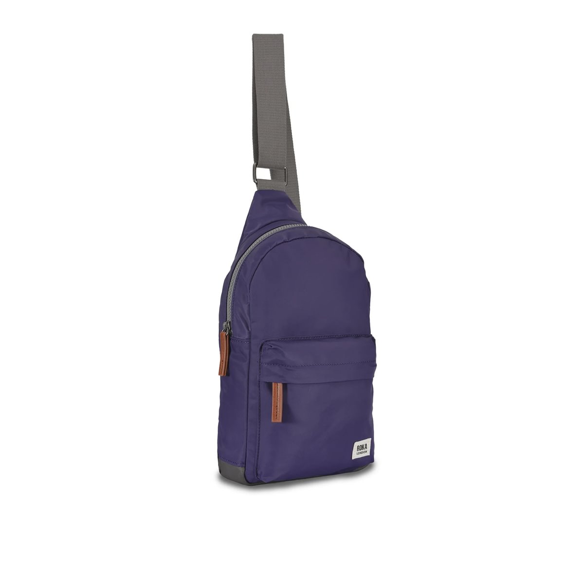 Purple sling bag with a strap on a white background