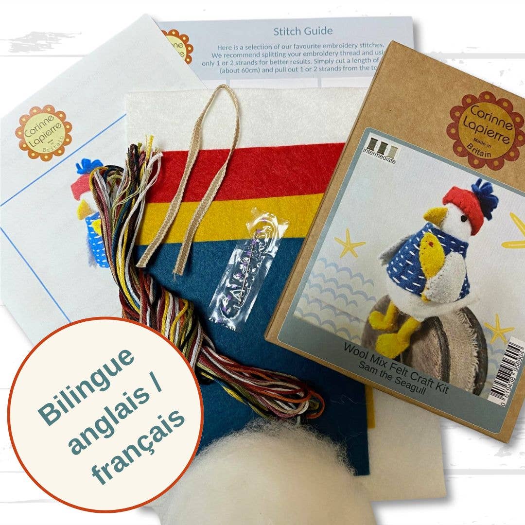 Seagull sewing kit inclusions with threads, felts, instructions, ribbon, needle and kraft packaging.