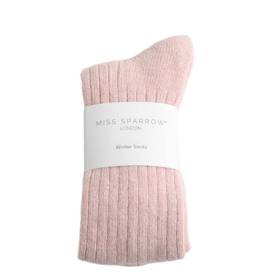 Pack of pink winter socks with 'Miss Sparrow London' label on a light gray background