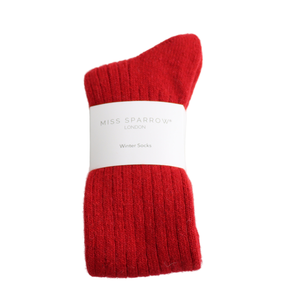 Red winter socks on a white background with 'Miss Sparrow' label.