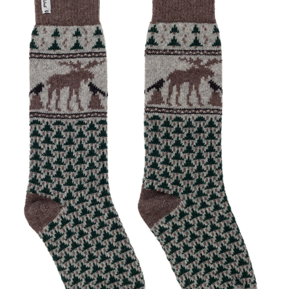 A pair of crew socks with a brown and beige houndstooth pattern, featuring a moose design in the middle and a small white brand tag near the cuff.
