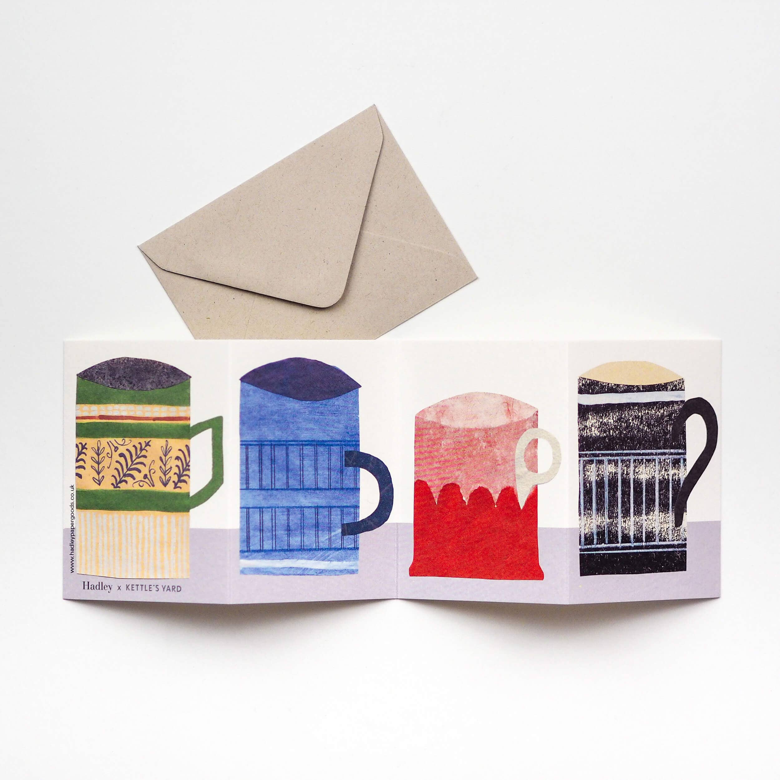 Greeting card with colorful mug illustrations and a beige envelope on a white background