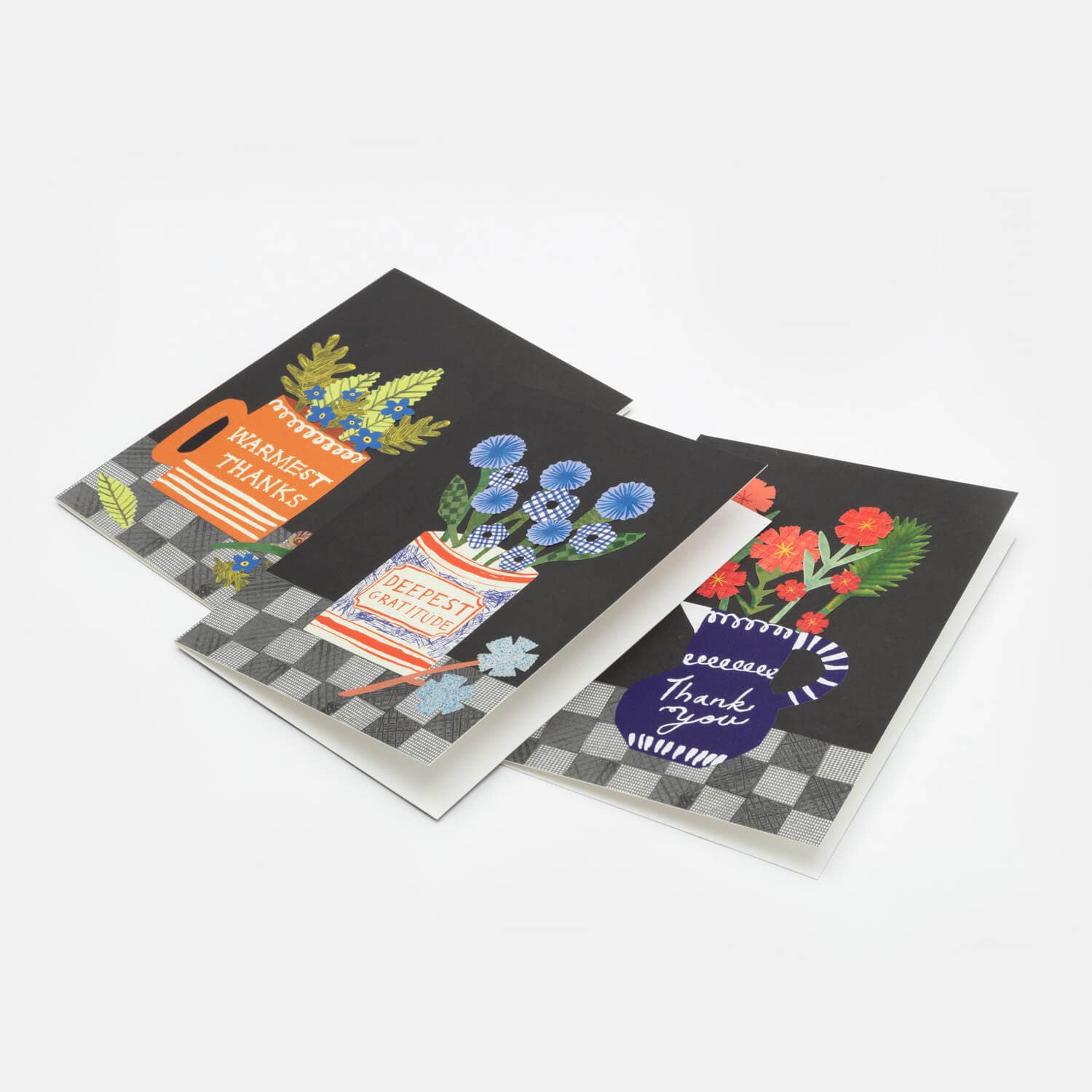 Two greeting cards with floral designs and text on a white background