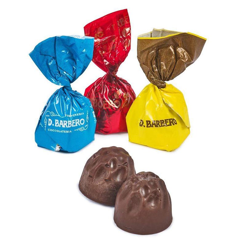 Colorful bags of D. Barbero chocolates on a white background
