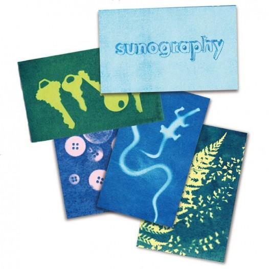 Set of colorful notebooks with various designs on a white background, featuring the brand 'sunography'.