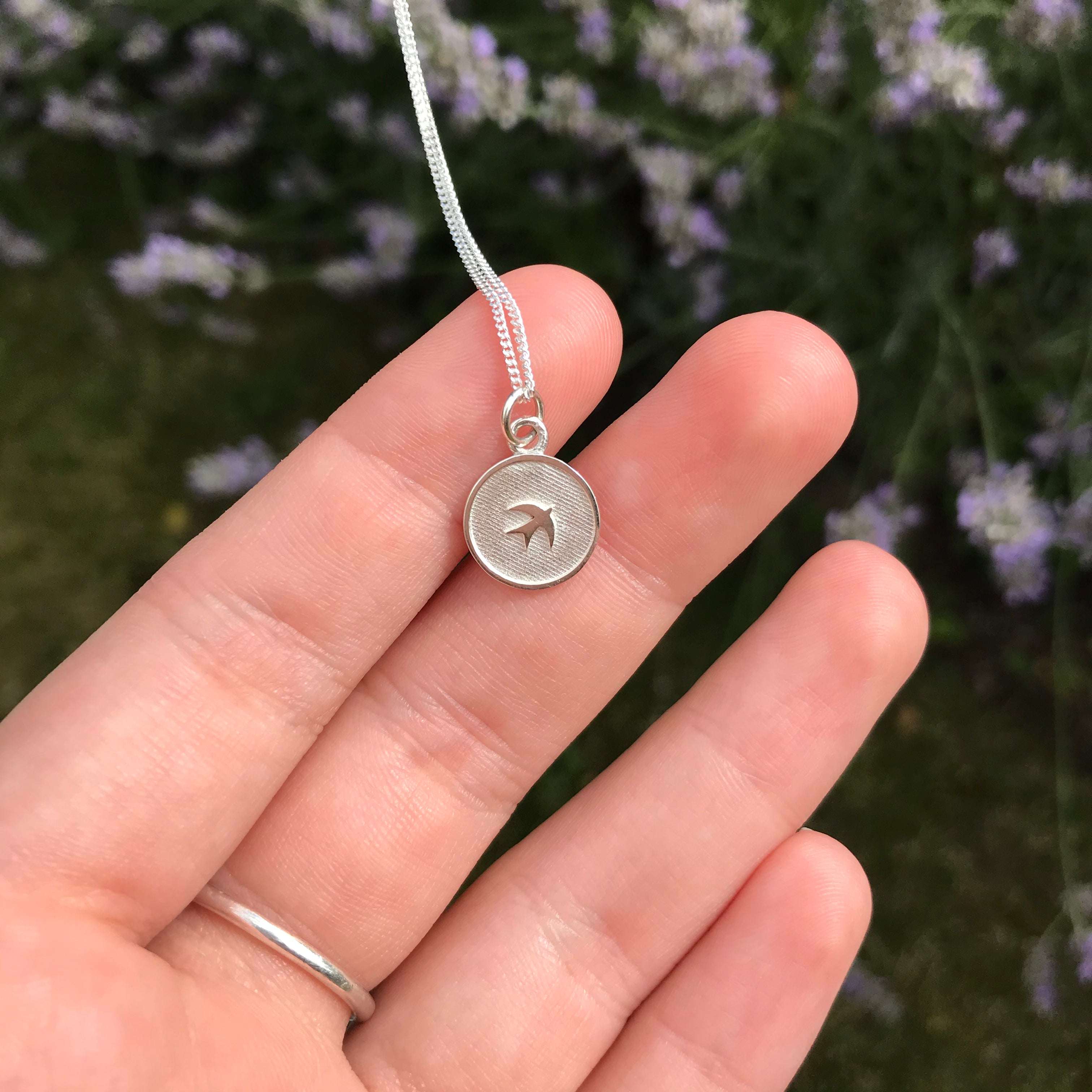 swallow design medallion