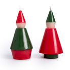 Two cone-shaped candles, one red and green, the other green and red, on a white background.