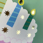 Decorative card with candles and stars on a green background
