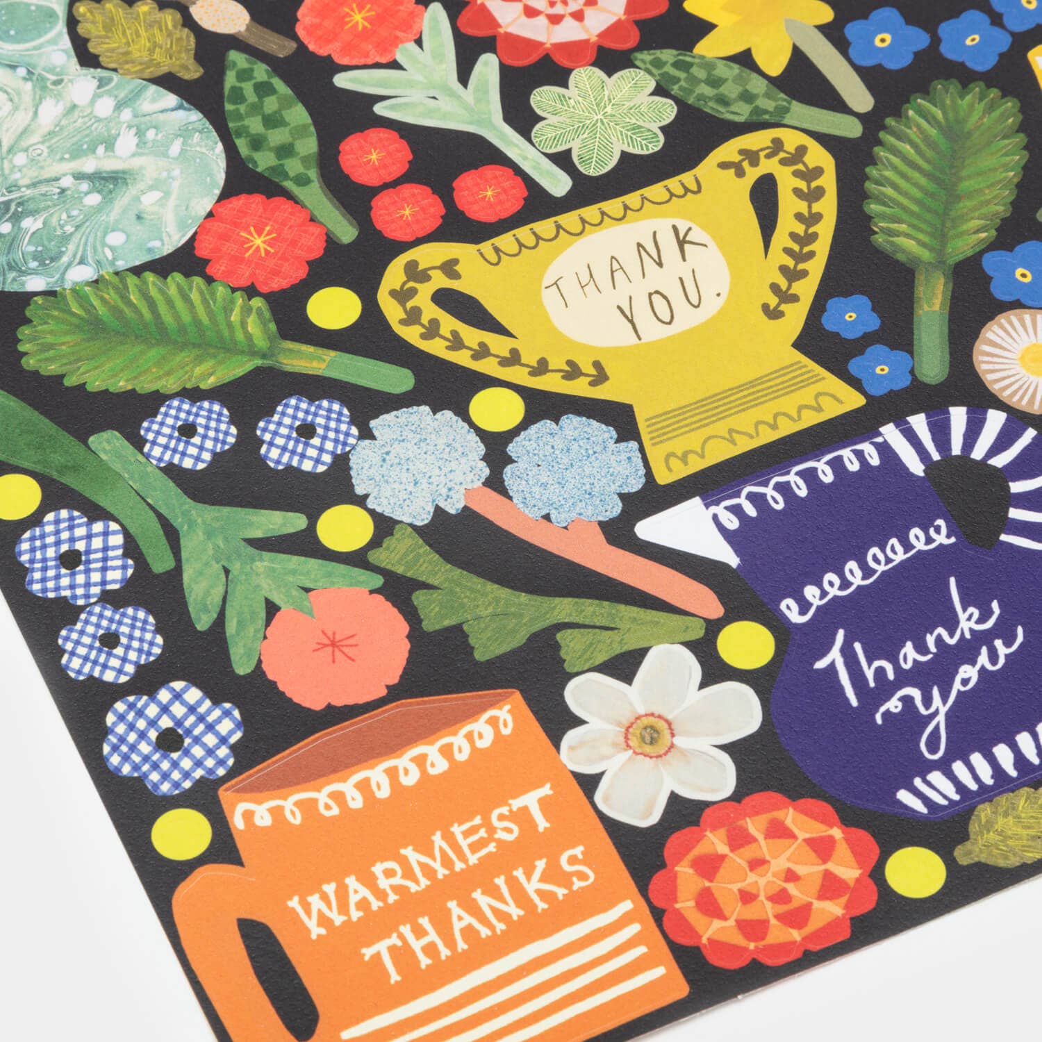 Colorful card with floral patterns, a yellow teacup, and text on a black background.