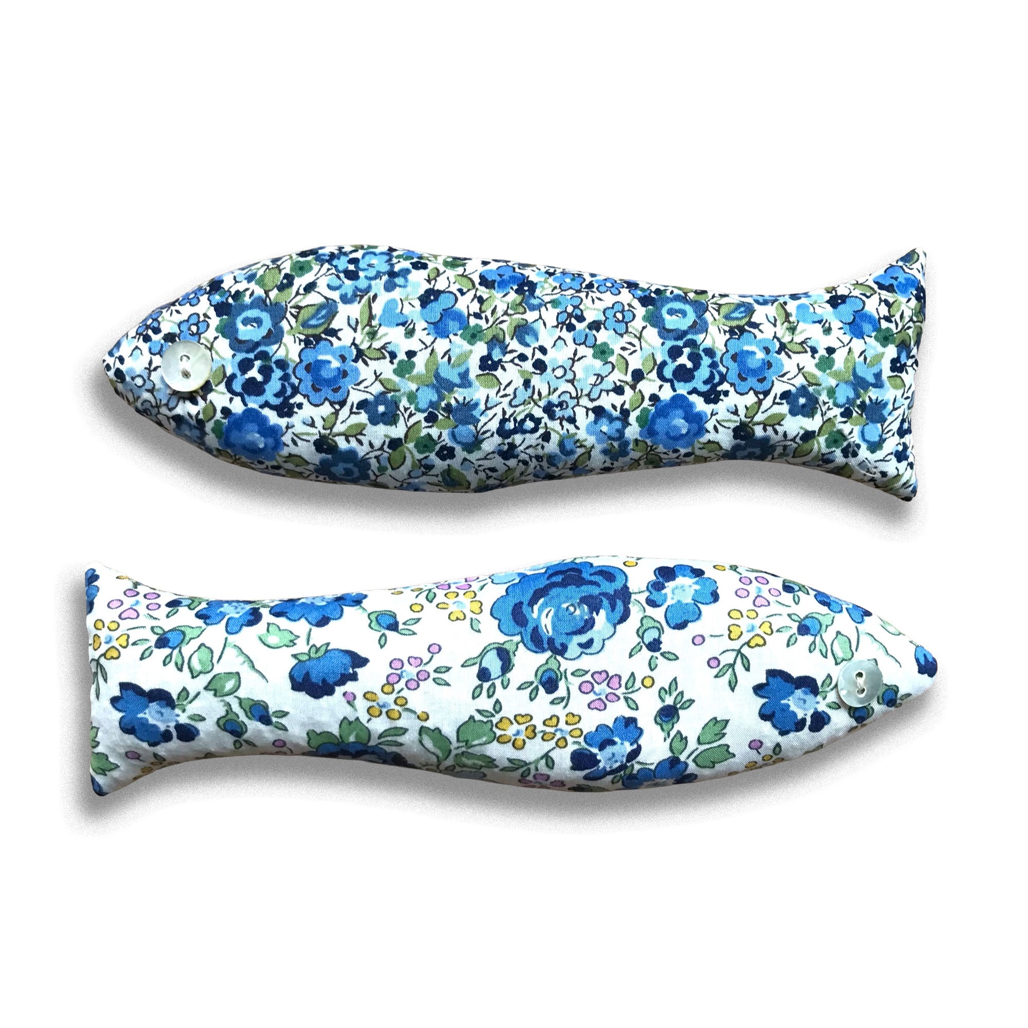 Two blue floral-patterned fish-shaped sachets on a white background