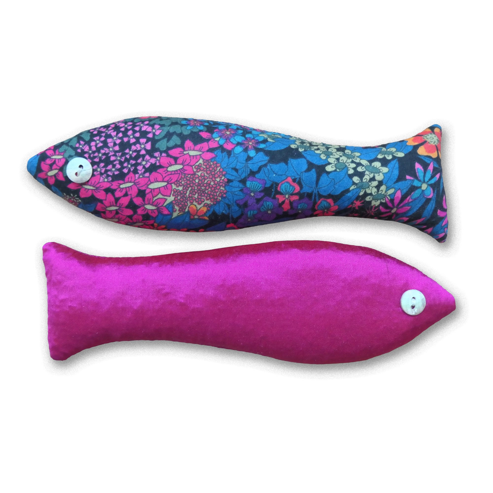 Two fish-shaped sachets, in pink and blue patterned fabric on a white background