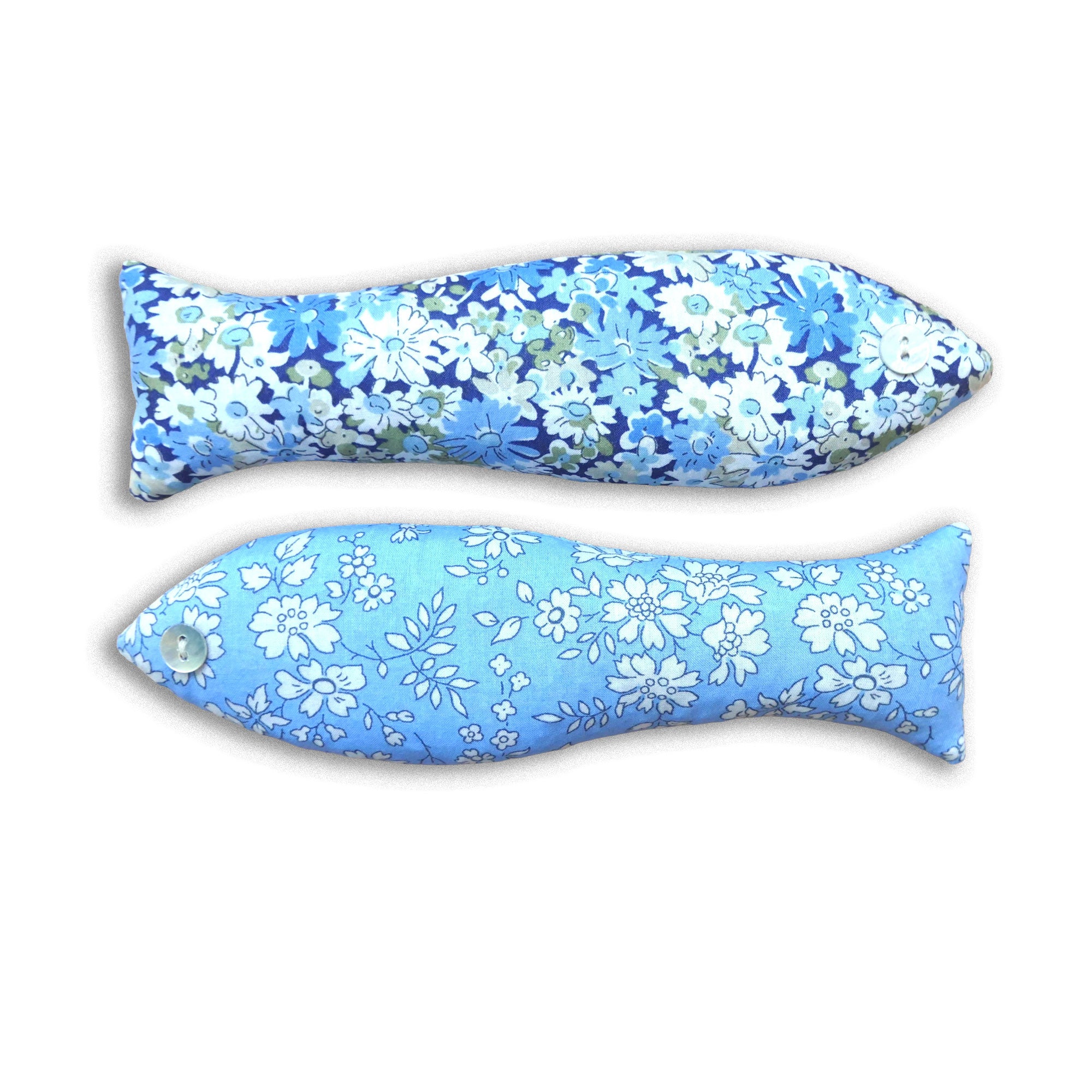 Two floral-patterned fish-shaped sachets on a white background