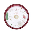 Wax protector lid showing the candle scent with illustrated design,