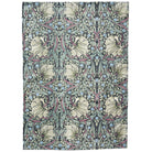 Floral patterned fabric with a green and beige design on a white background