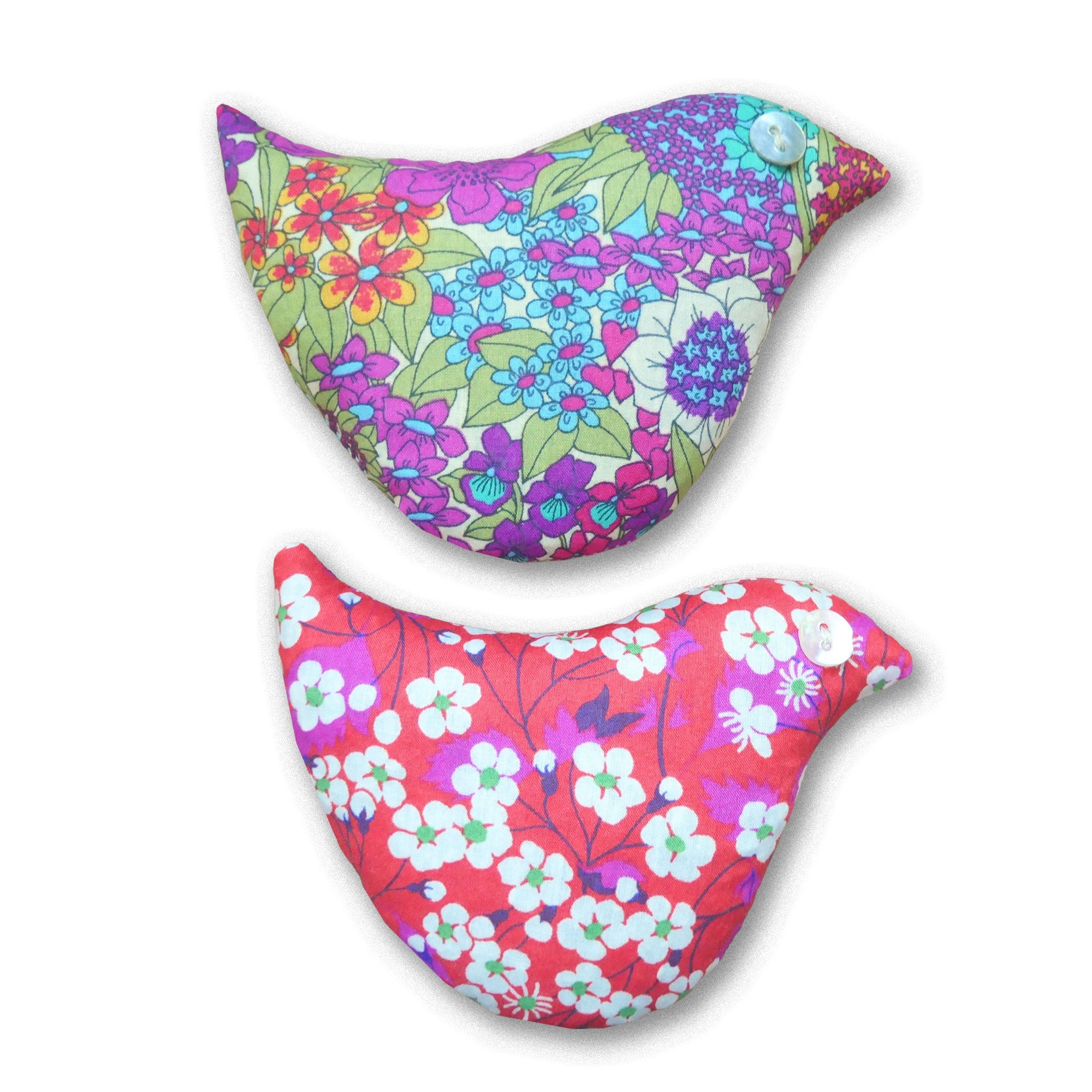 Two floral-patterned lavender birds on a white background