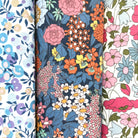 Three floral cotton hankies in purple and pink Liberty prints