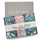 Box of cotton handkerchiefs in Strawberry Thief pattern with 'lime tree design' branding