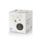 White product packaging box with decorative elements and branding on a white background
