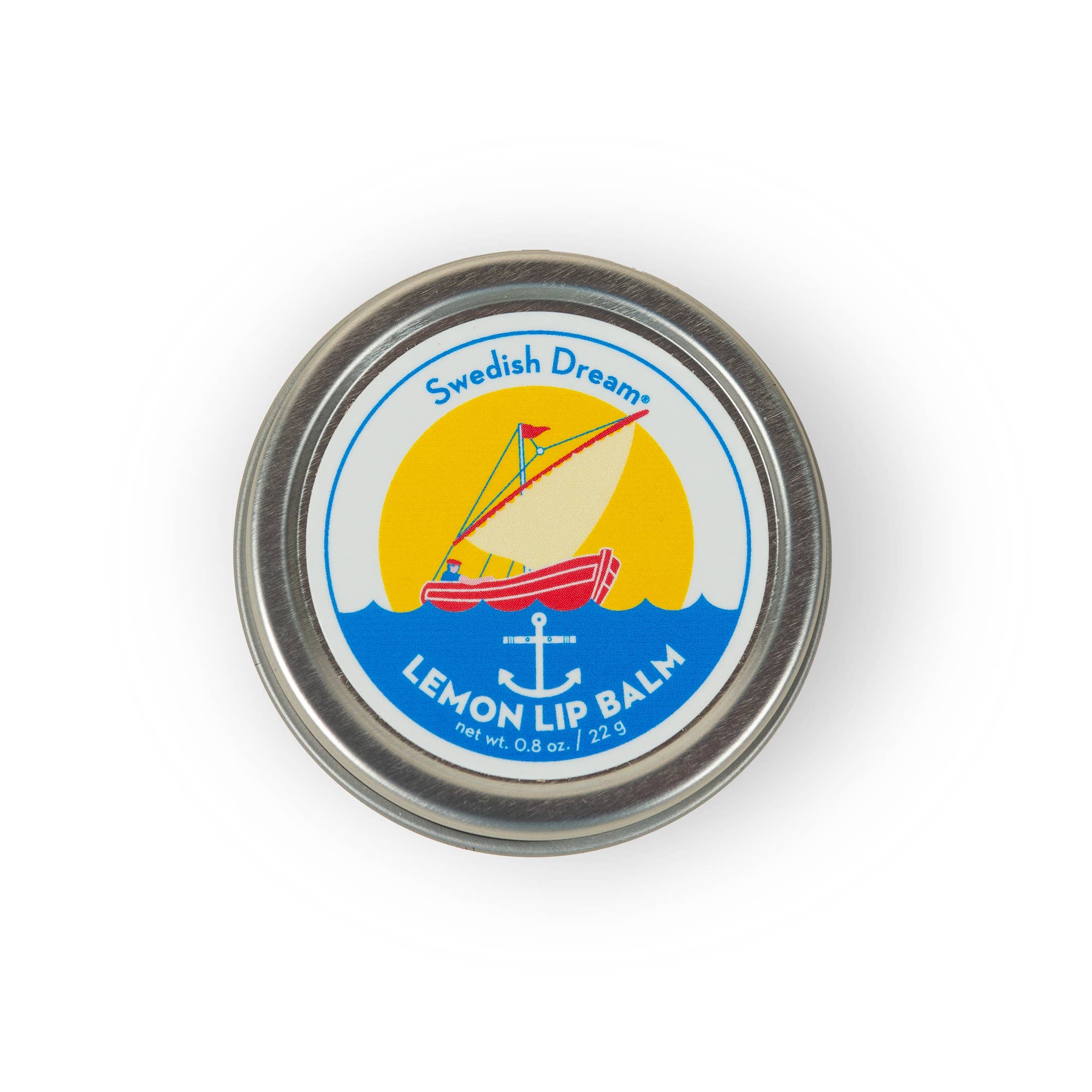Lid of a Swedish Dream Lemon Lip Balm container on a white background