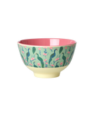 Bowl with floral and peacock design on a white background