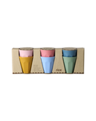 Set of four colorful cups in a cardboard packaging with 'rice' branding on a white background.