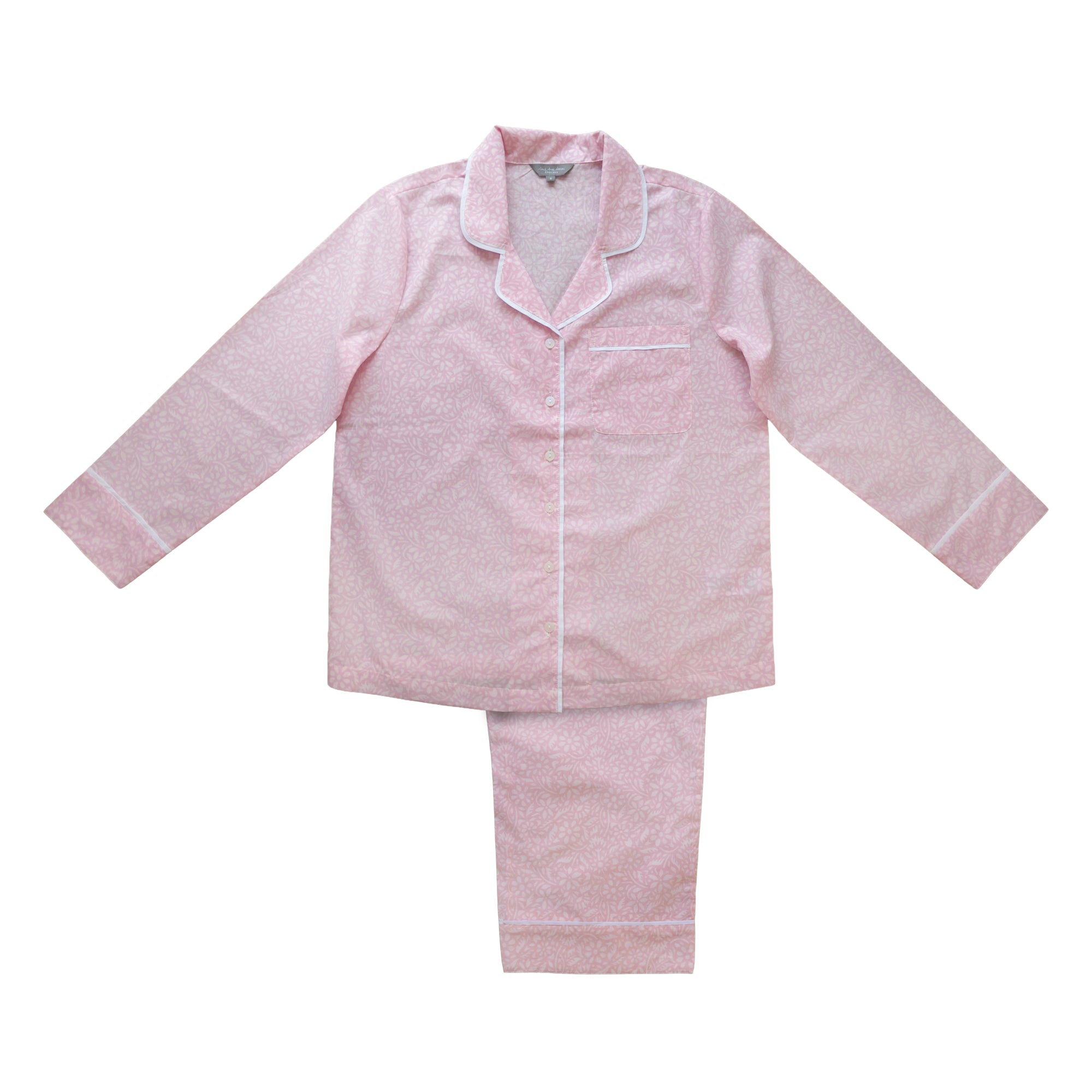 Pink pajama set on a white background