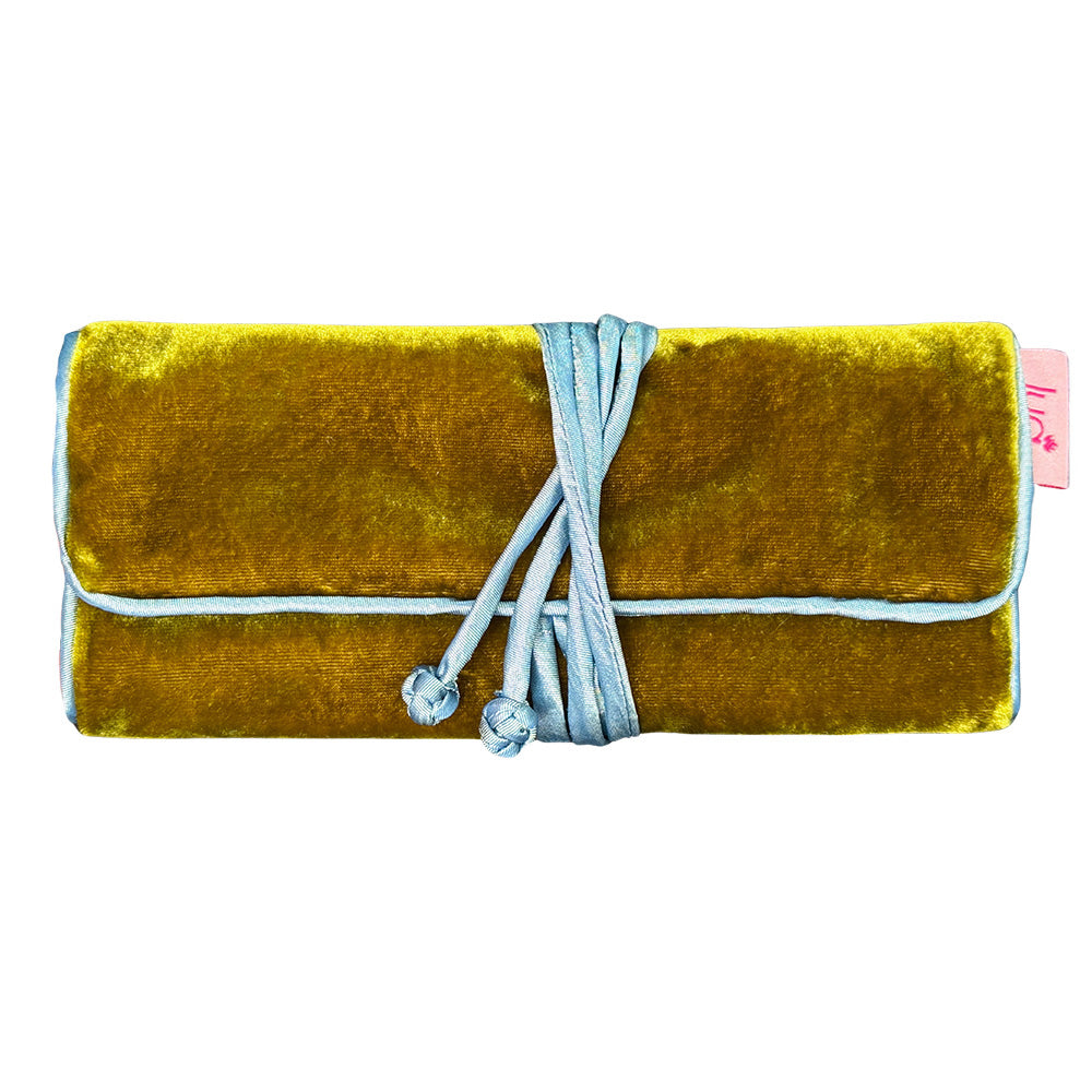 A mustard yellow velvet clutch bag with a light blue rope tie closure, shown on a solid white background.