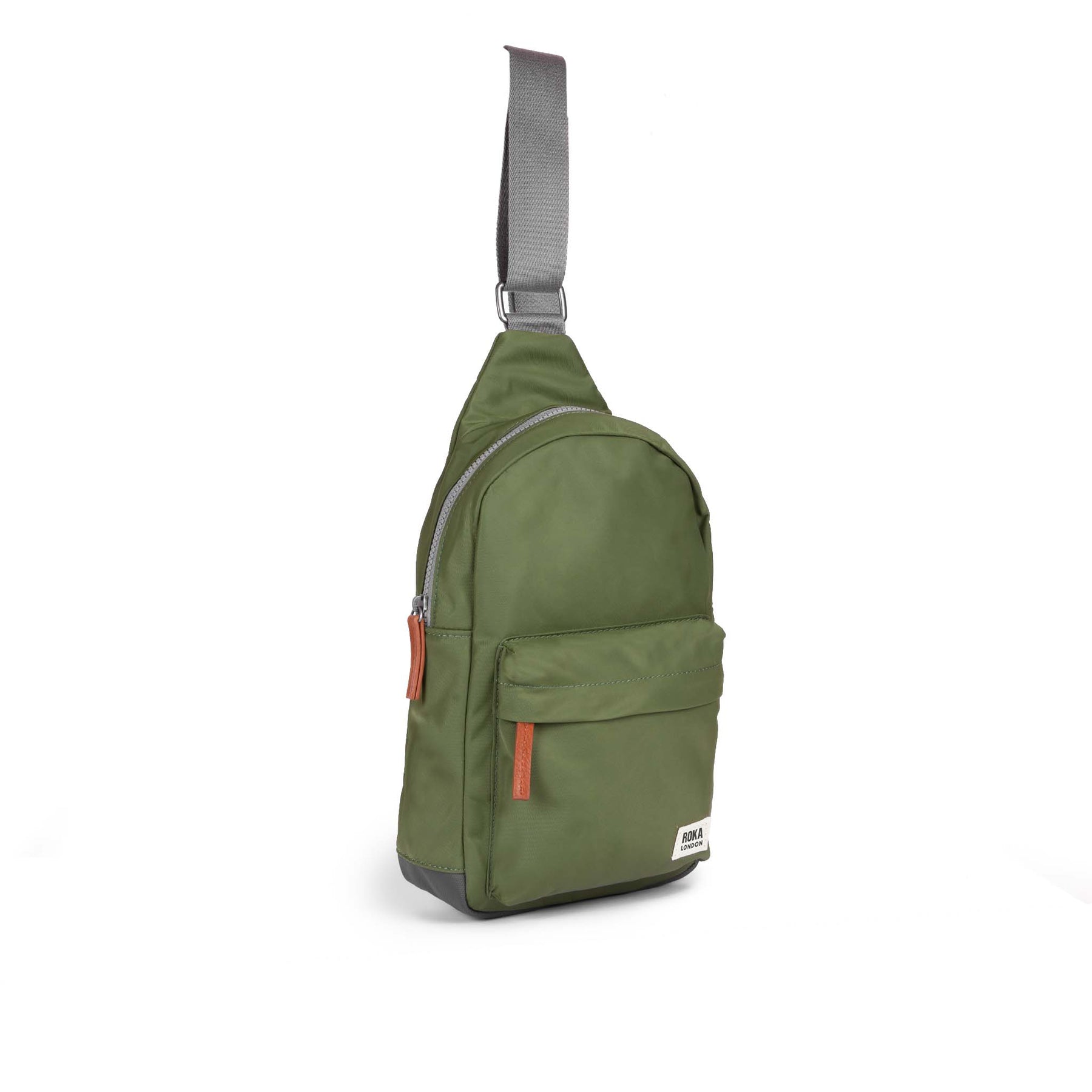 Green sling bag with a strap on a white background