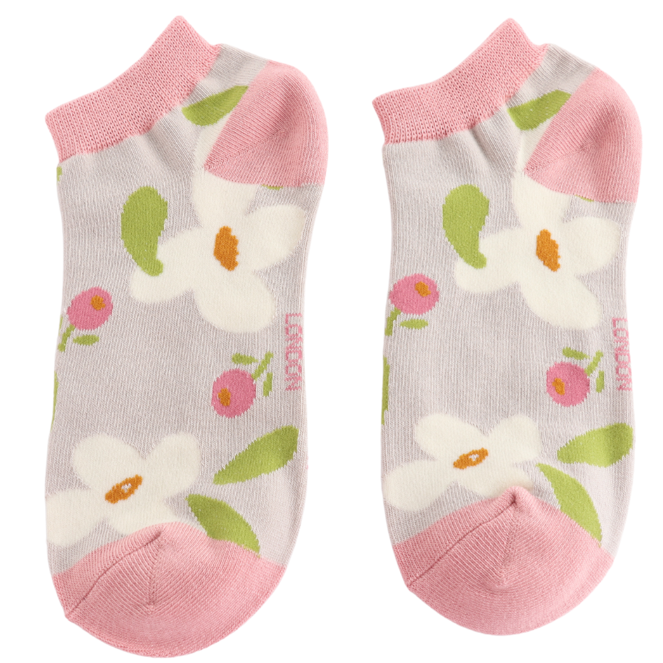 Pair of socks with floral pattern and pink accents on a white background
