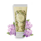 Shower gel packaging with verbena design and purple flowers on a white background