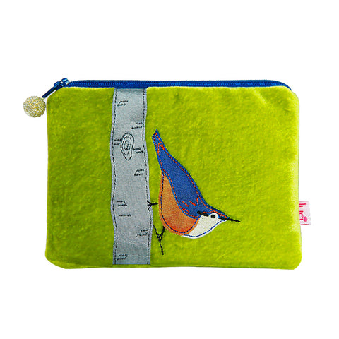 Photo of a small rectangular purse made from lime green velvet with a blue and orange bird sitting on a grey branch appliquéd onto the front. The zip is blue and has a beaded spherical zip pull.