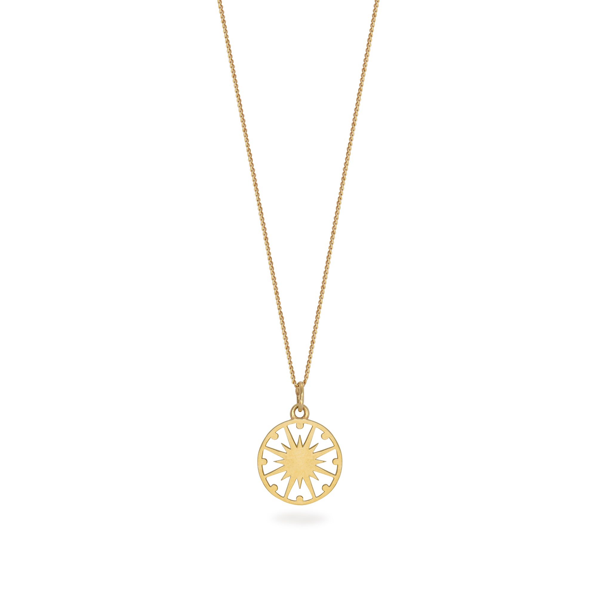 gold supernova necklace on white background 